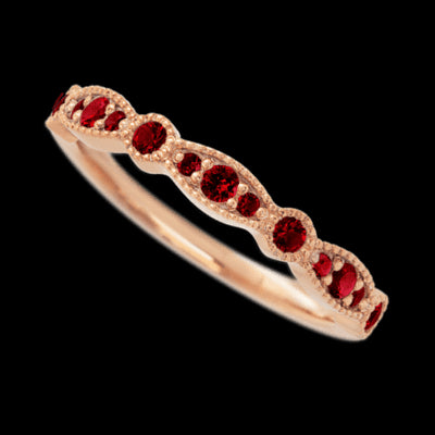 14K Rose Gold band with 7 Round and 6 Round Dark Ruby having TCW-.27