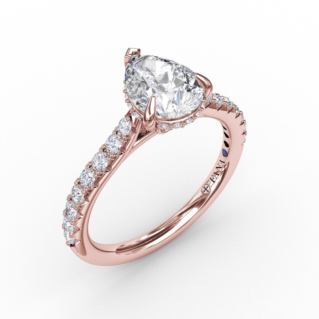 Classic Pear Shape Engagement Ring with a Subtle Diamond Splash