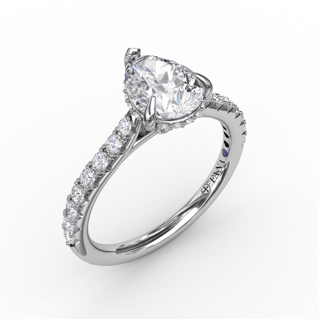 Classic Pear Shape Engagement Ring with a Subtle Diamond Splash