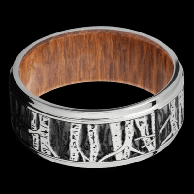 9 mm wide/Flat Grooved Edges/Cobalt Chrome band with a laser carved Aspen pattern also featuring a Leopard Wood sleeve.