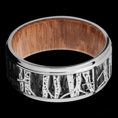 9 mm wide/Flat Grooved Edges/Cobalt Chrome band with a laser carved Aspen pattern also featuring a Leopard Wood sleeve.