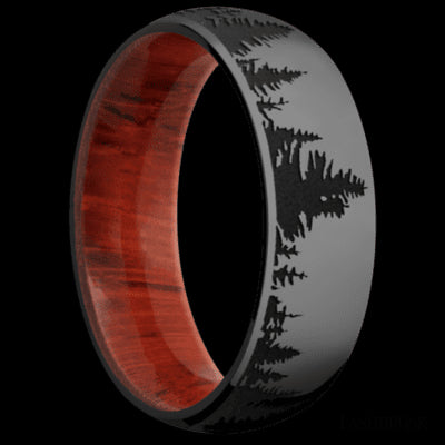 7 mm wide/Domed/Zirconium band with a laser carved Trees pattern also featuring a Padauk sleeve.