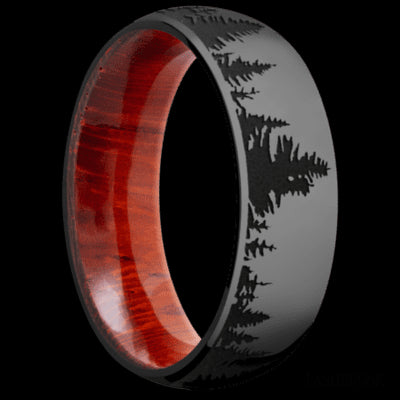 7 mm wide/Domed/Zirconium band with a laser carved Trees pattern also featuring a Padauk sleeve.