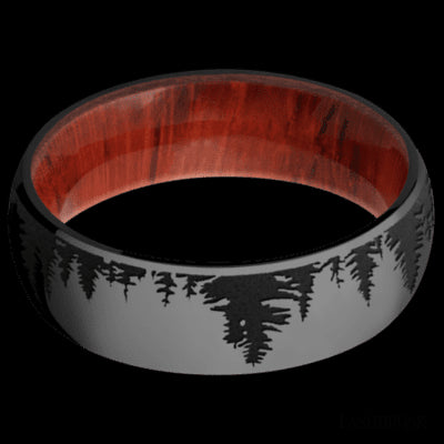 7 mm wide/Domed/Zirconium band with a laser carved Trees pattern also featuring a Padauk sleeve.