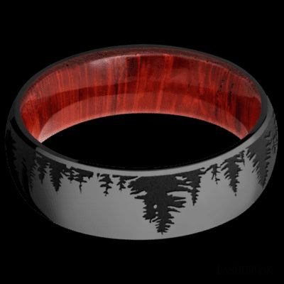 7 mm wide/Domed/Zirconium band with a laser carved Trees pattern also featuring a Padauk sleeve.