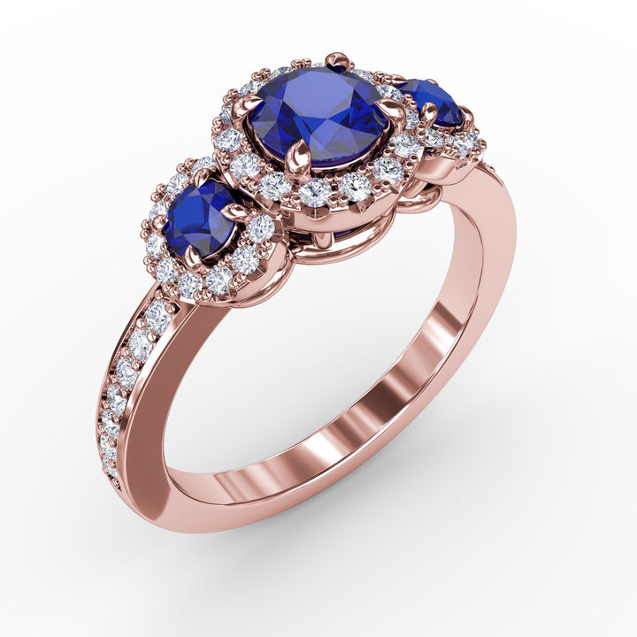 Dazzling Three Stone Sapphire And Diamond Ring