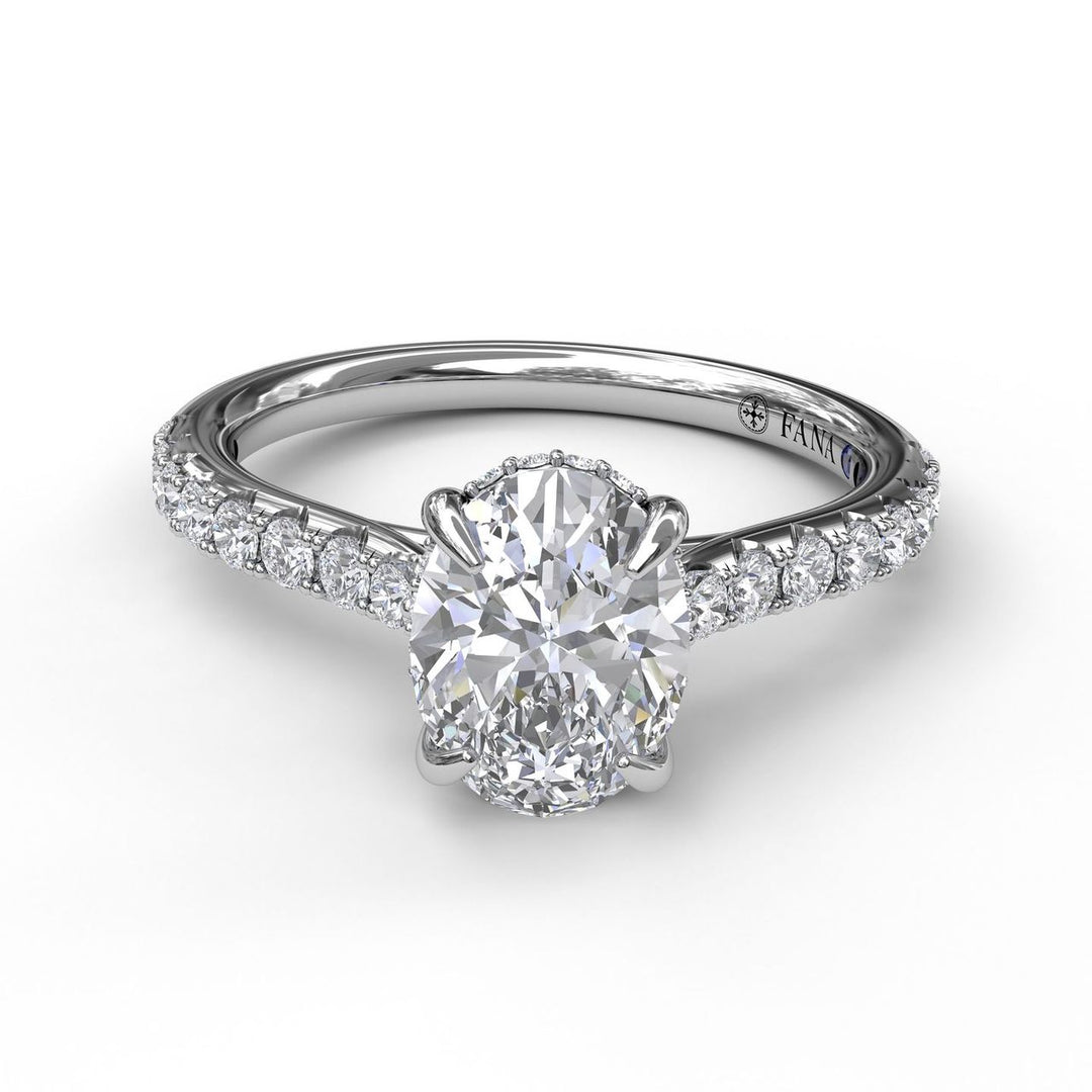Classic Oval Cut Engagement Ring with a Subtle Diamond Splash