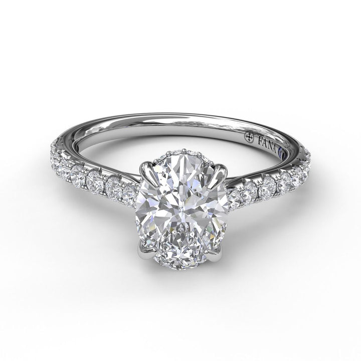 Classic Oval Cut Engagement Ring with a Subtle Diamond Splash