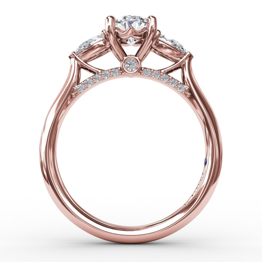 Classic Oval Three-Stone Diamond Engagement Ring With Pear-Shape Side Diamonds