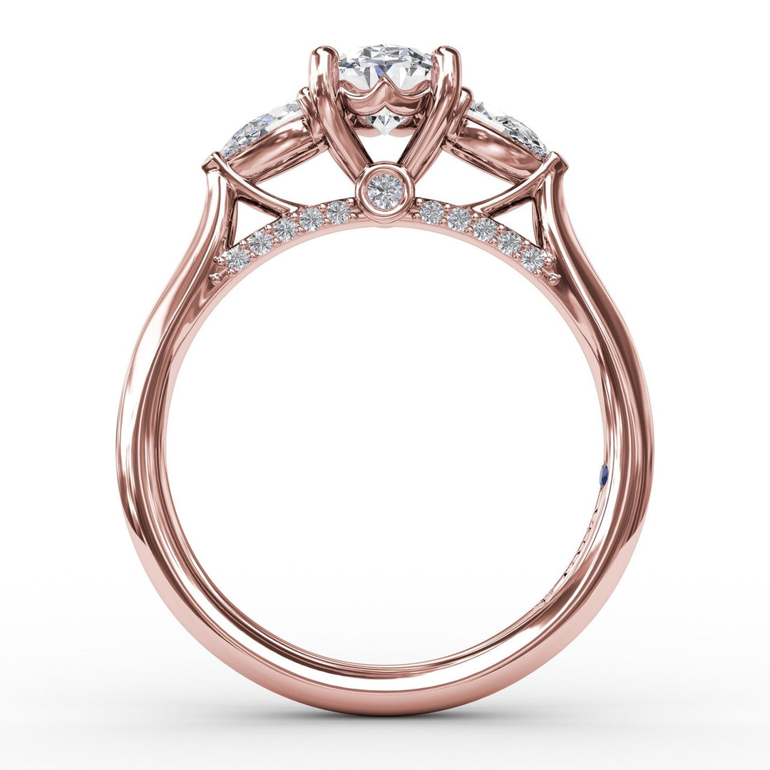 Classic Oval Three-Stone Diamond Engagement Ring With Pear-Shape Side Diamonds