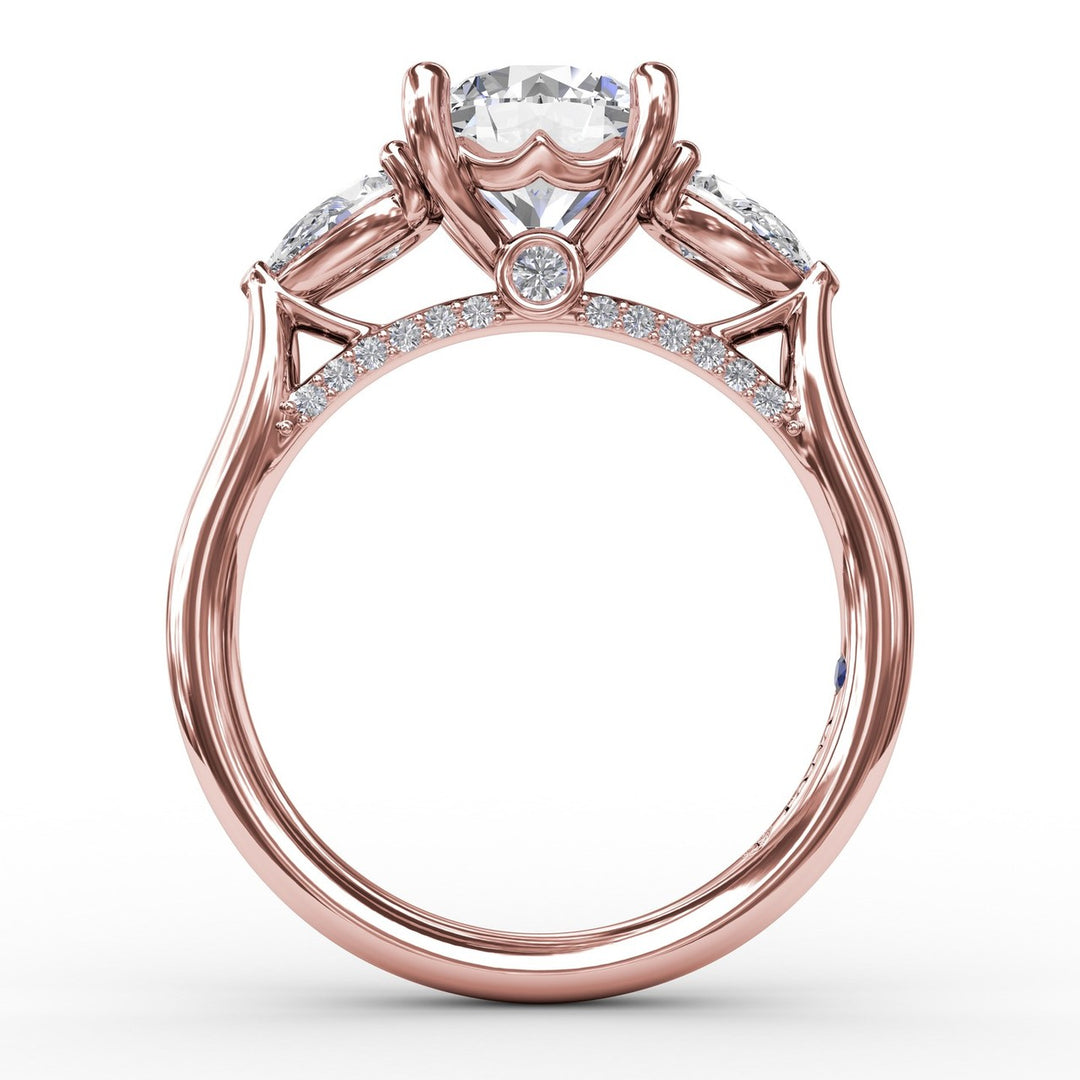Classic Three-Stone Engagement Ring With Pear-Shape Side Diamonds