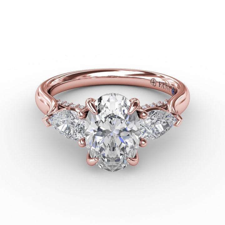Classic Three-Stone Oval Engagement Ring With Pear-Shape Side Stones