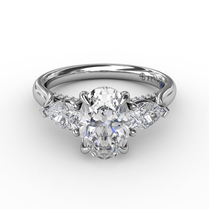 Classic Three-Stone Oval Engagement Ring With Pear-Shape Side Stones