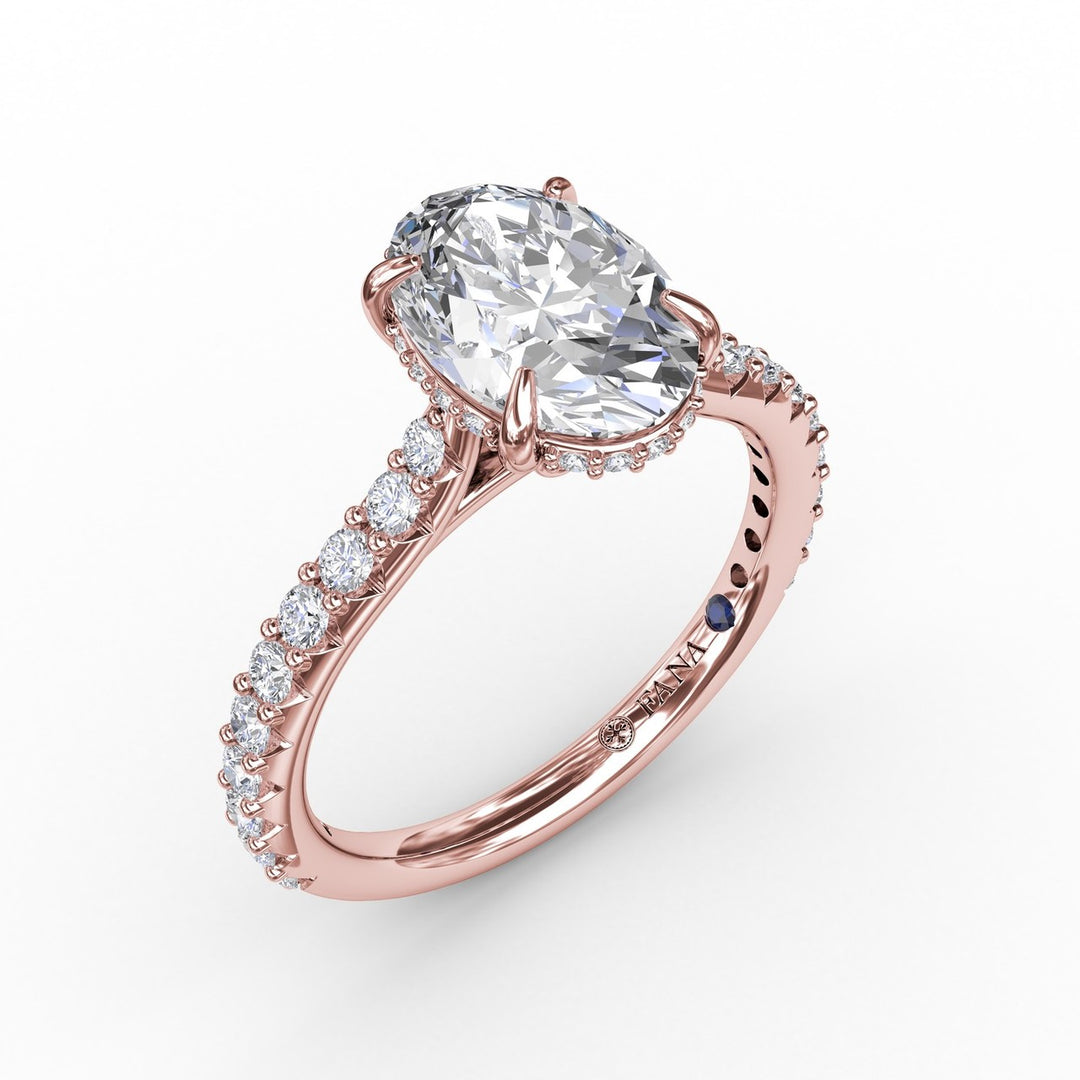 Classic Oval Diamond Solitaire Engagement Ring With Hidden Pav? Halo