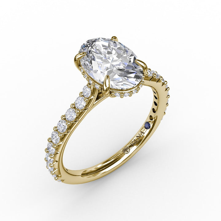 Classic Oval Diamond Solitaire Engagement Ring With Hidden Pav? Halo