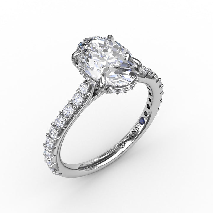 Classic Oval Diamond Solitaire Engagement Ring With Hidden Pav? Halo