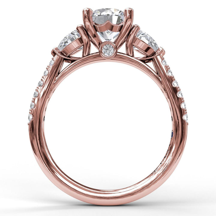 Three-Stone Engagement Ring With Pear Cut Side Stones