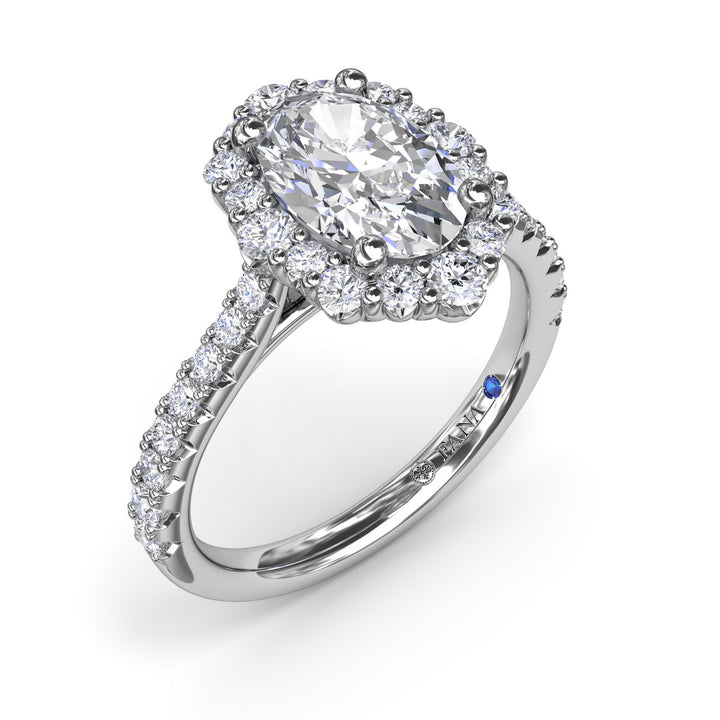 Oval Diamond Graduated Halo Engagement Ring