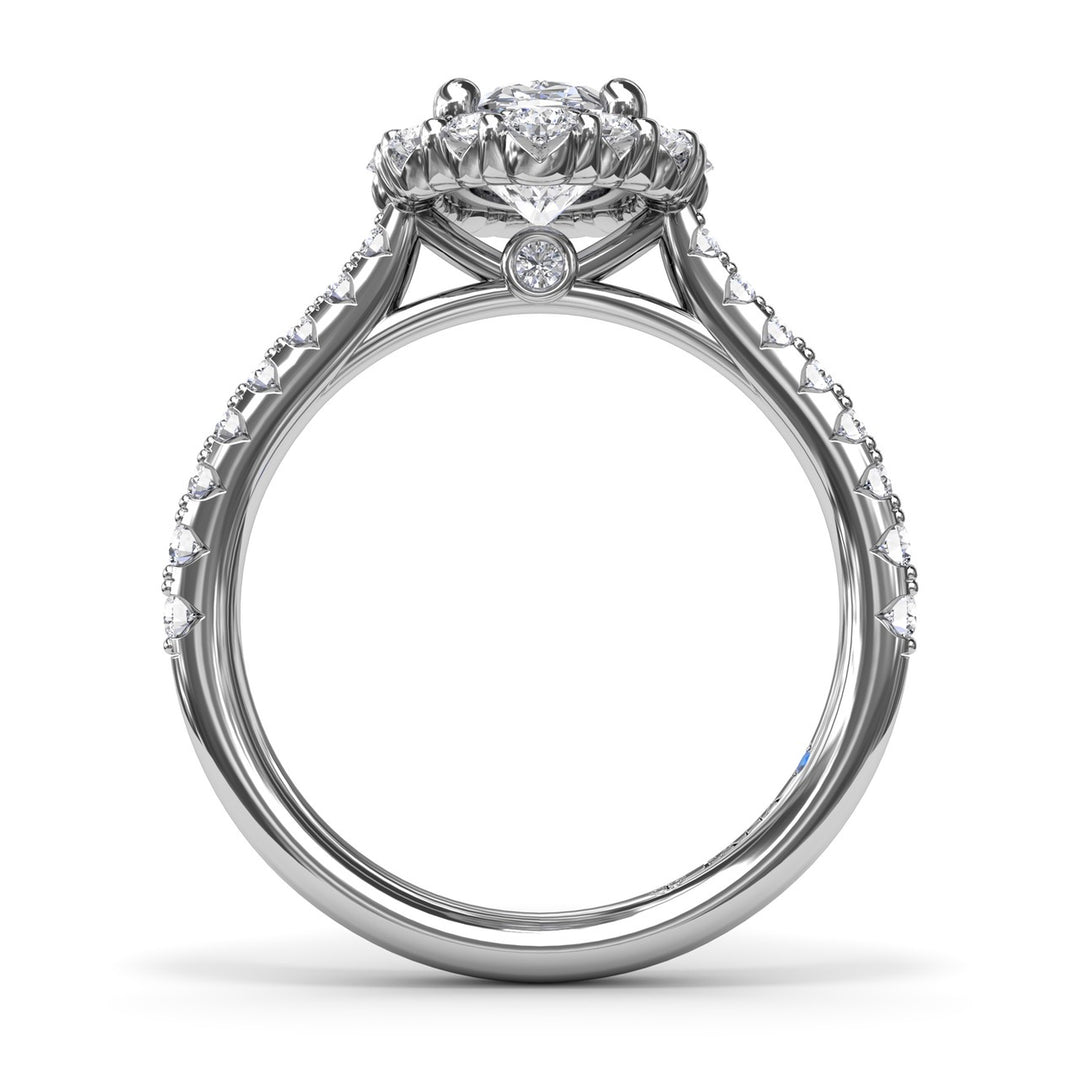 Oval Diamond Graduated Halo Engagement Ring