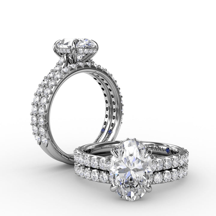 Classic Oval Diamond Solitaire Engagement Ring With Hidden PavÃ© Halo