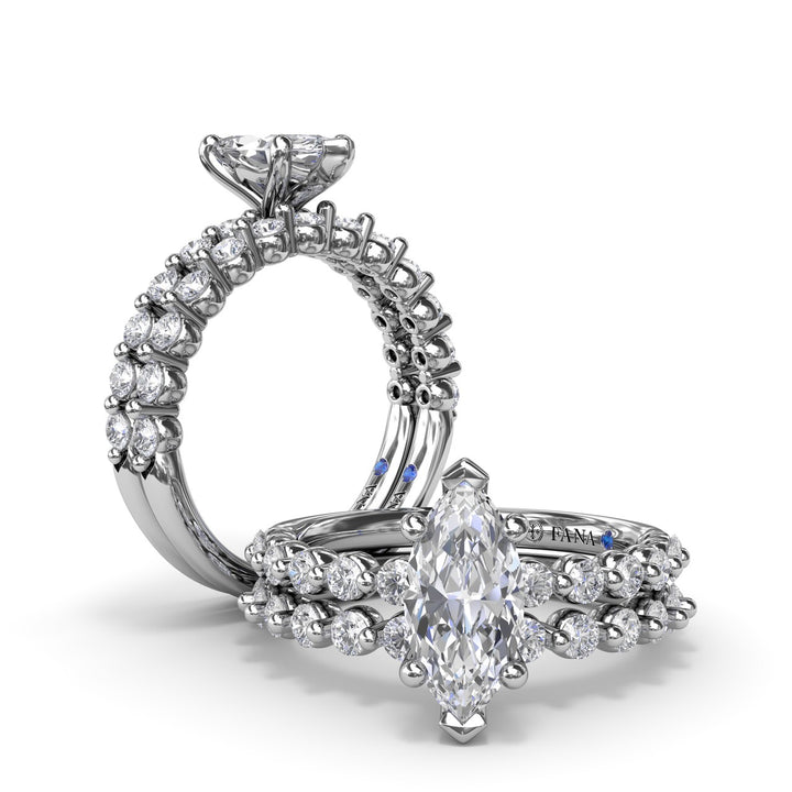 Contemporary Marquise Solitaire Engagement Ring With Diamond Band