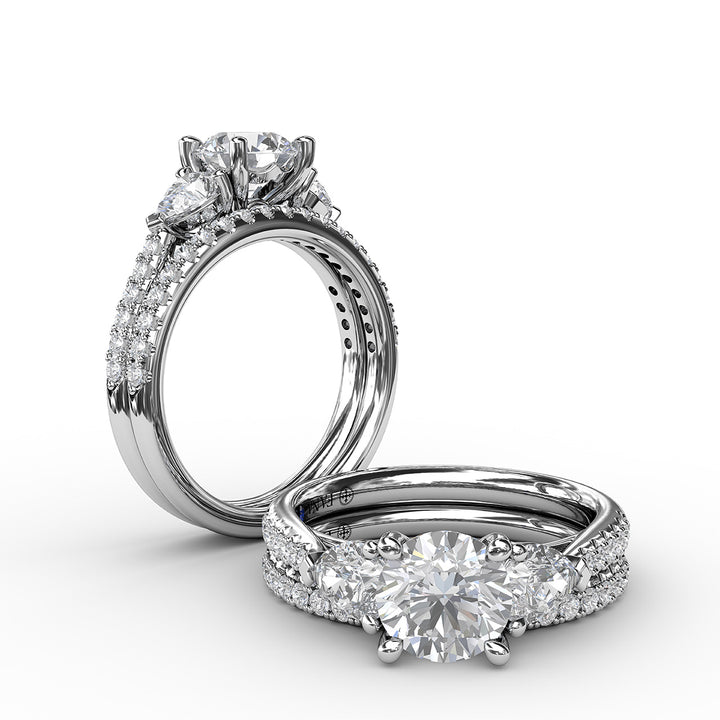 Elegant Pear Sidestone Ring in Sapphire