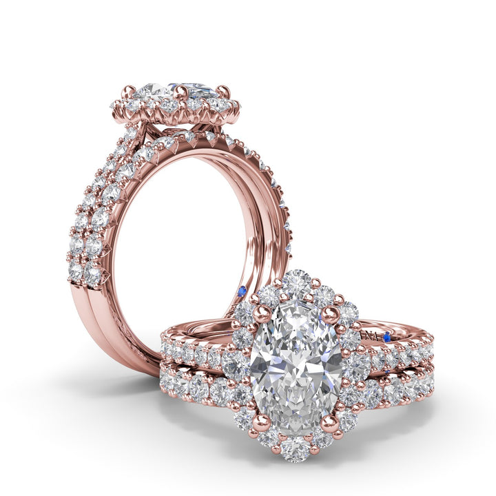 Oval Diamond Graduated Halo Engagement Ring