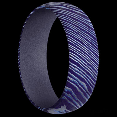 7 mm wide Domed Titanium Damascus band featuring a Crushed Orchid sleeve.