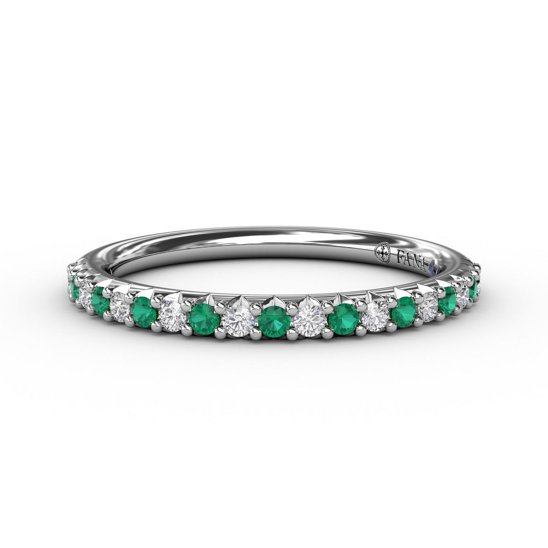 Delicate Emerald Shared Prong Anniversary Band
