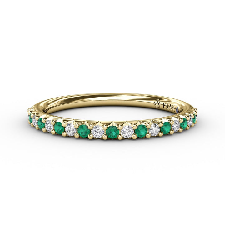 Delicate Emerald Shared Prong Anniversary Band