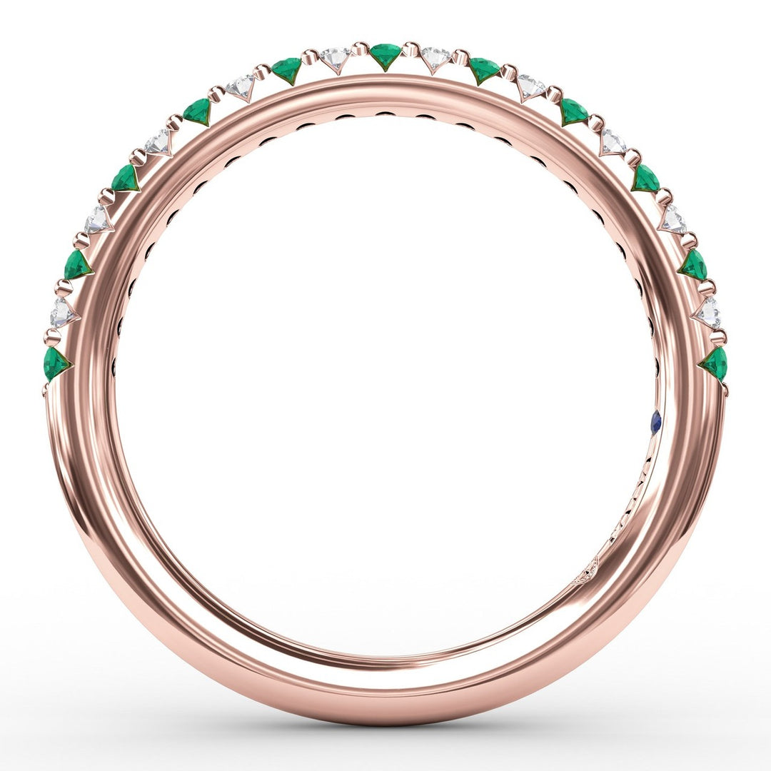 Delicate Emerald Shared Prong Anniversary Band