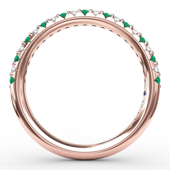 Delicate Emerald Shared Prong Anniversary Band