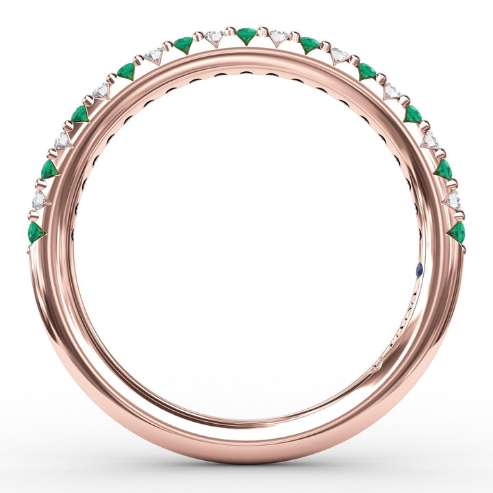 Delicate Emerald Shared Prong Anniversary Band
