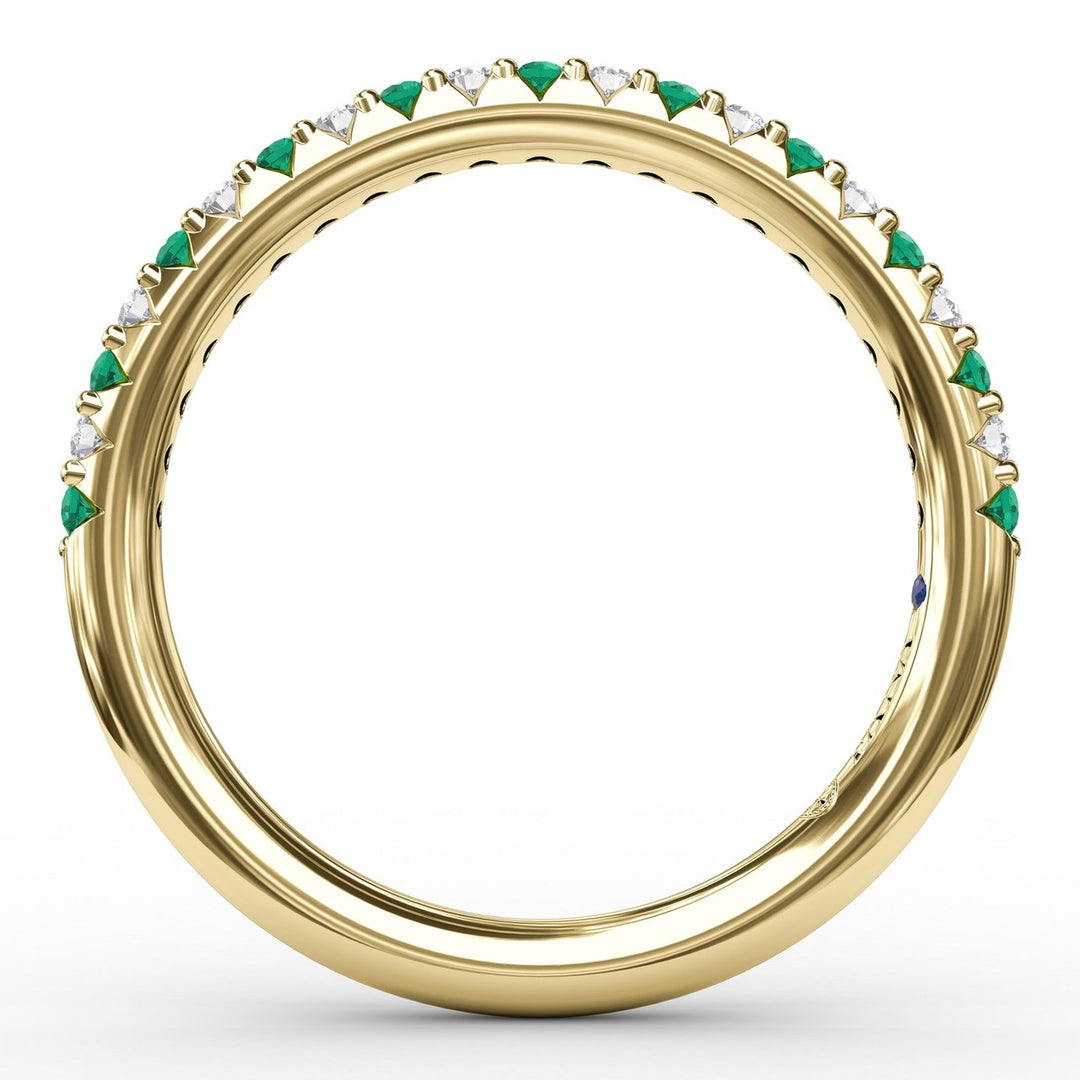 Delicate Emerald Shared Prong Anniversary Band