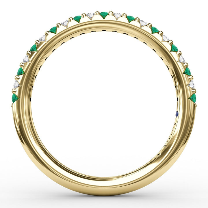 Delicate Emerald Shared Prong Anniversary Band