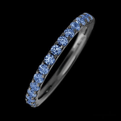 Zirconium band with 15 Round Denim Sapphire having TCW-.45