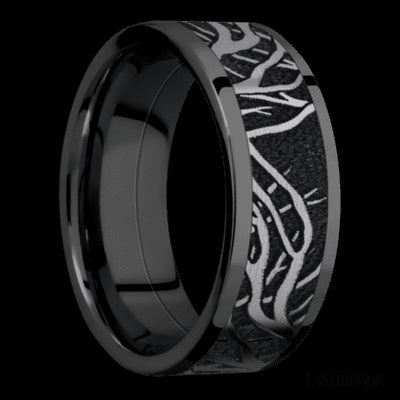 8 mm wide/Flat/Zirconium band with one 6 mm Centered inlay of Tantalum with a laser carved Branches pattern.